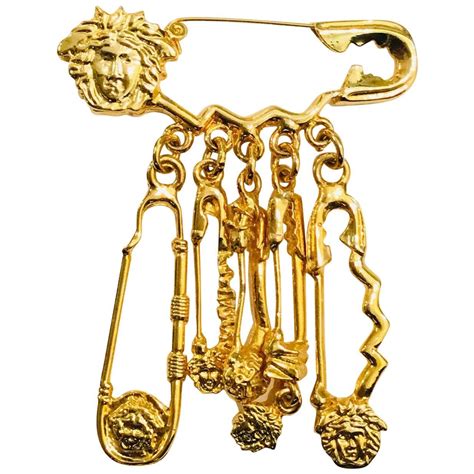 versace brooch pins